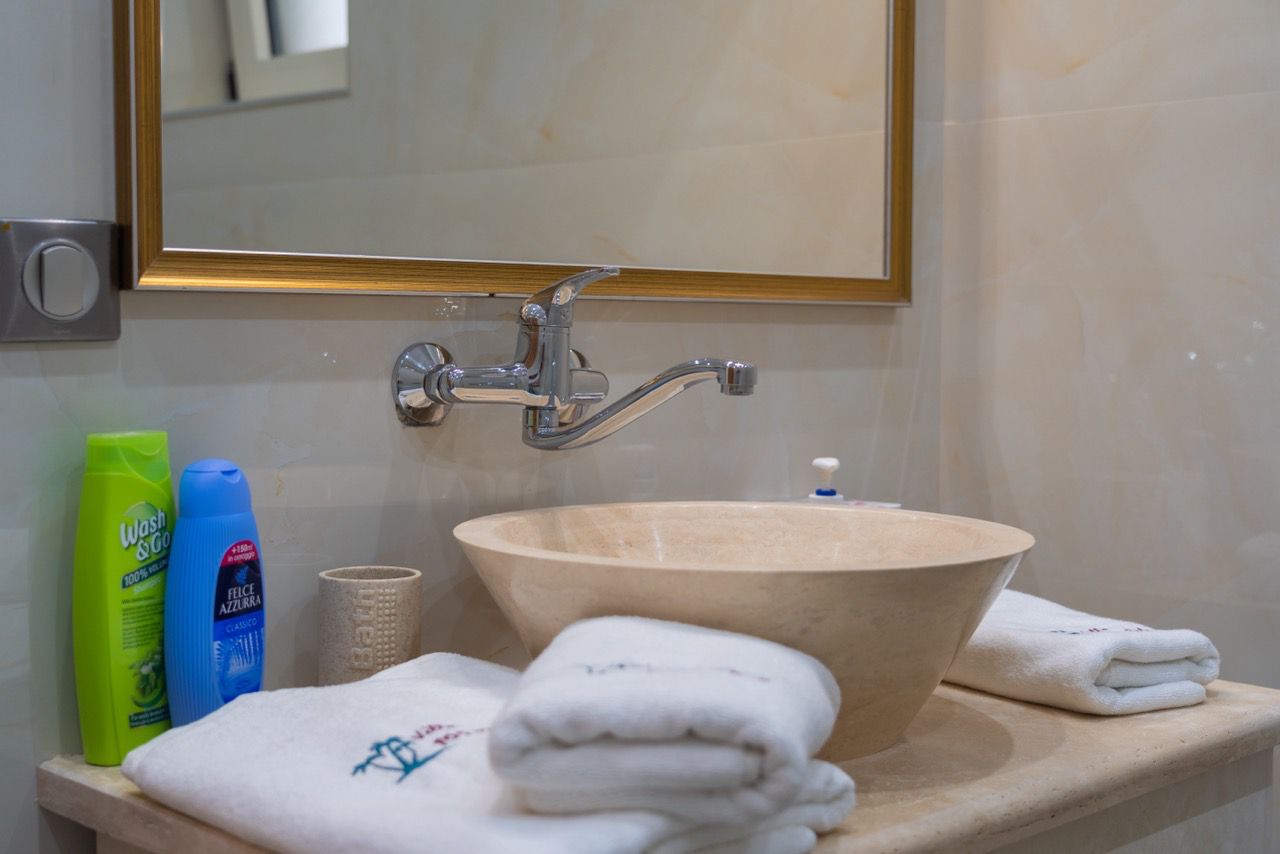 Elegant bathroom in Ulcinj, Montenegro with modern sink and premium finishes&mdash;invest via immobilien.ekosphere.me by Ekosphere Doo.