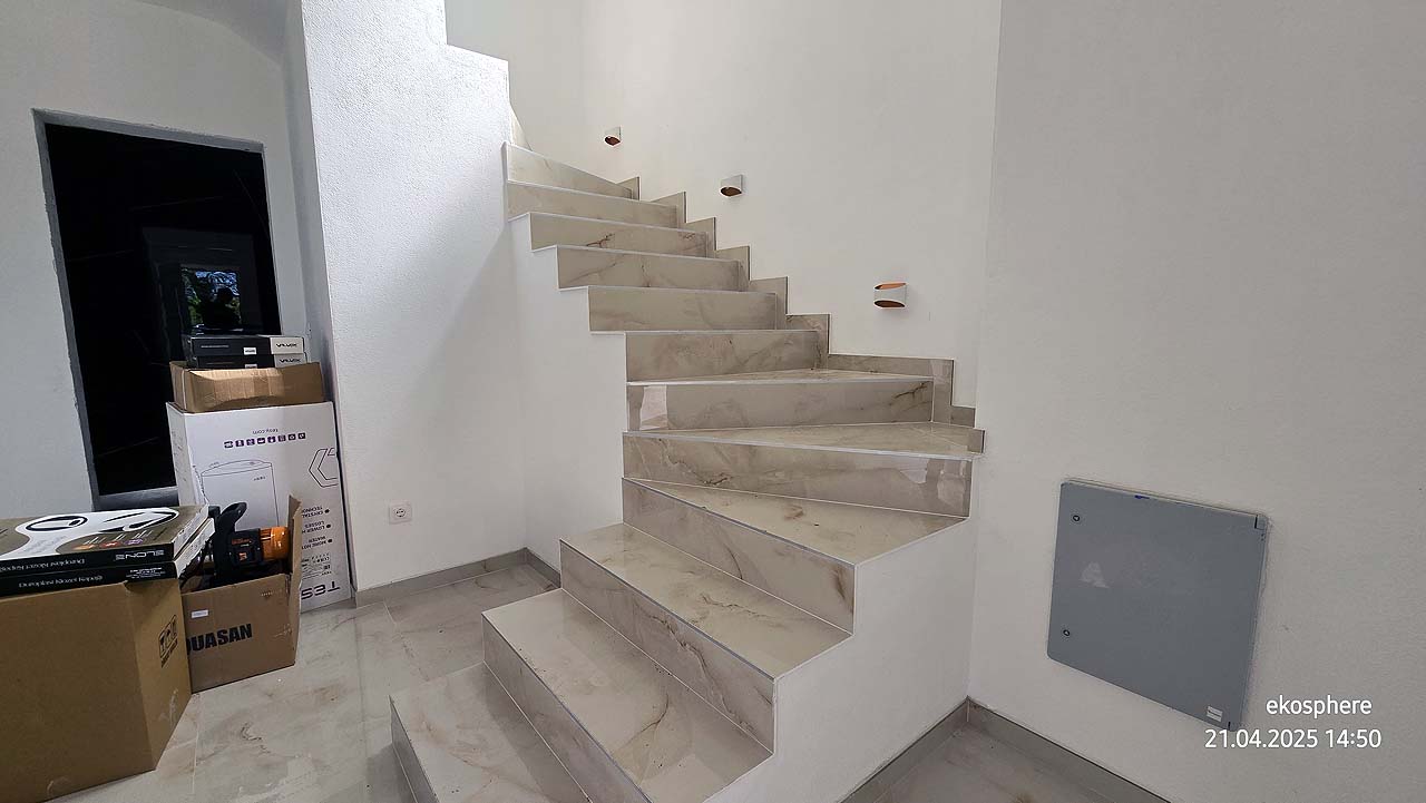 Elegant marble staircase with sleek, modern design&mdash;prime Ulcinj Montenegro property on immobilien.ekosphere.me by ekosphere doo.