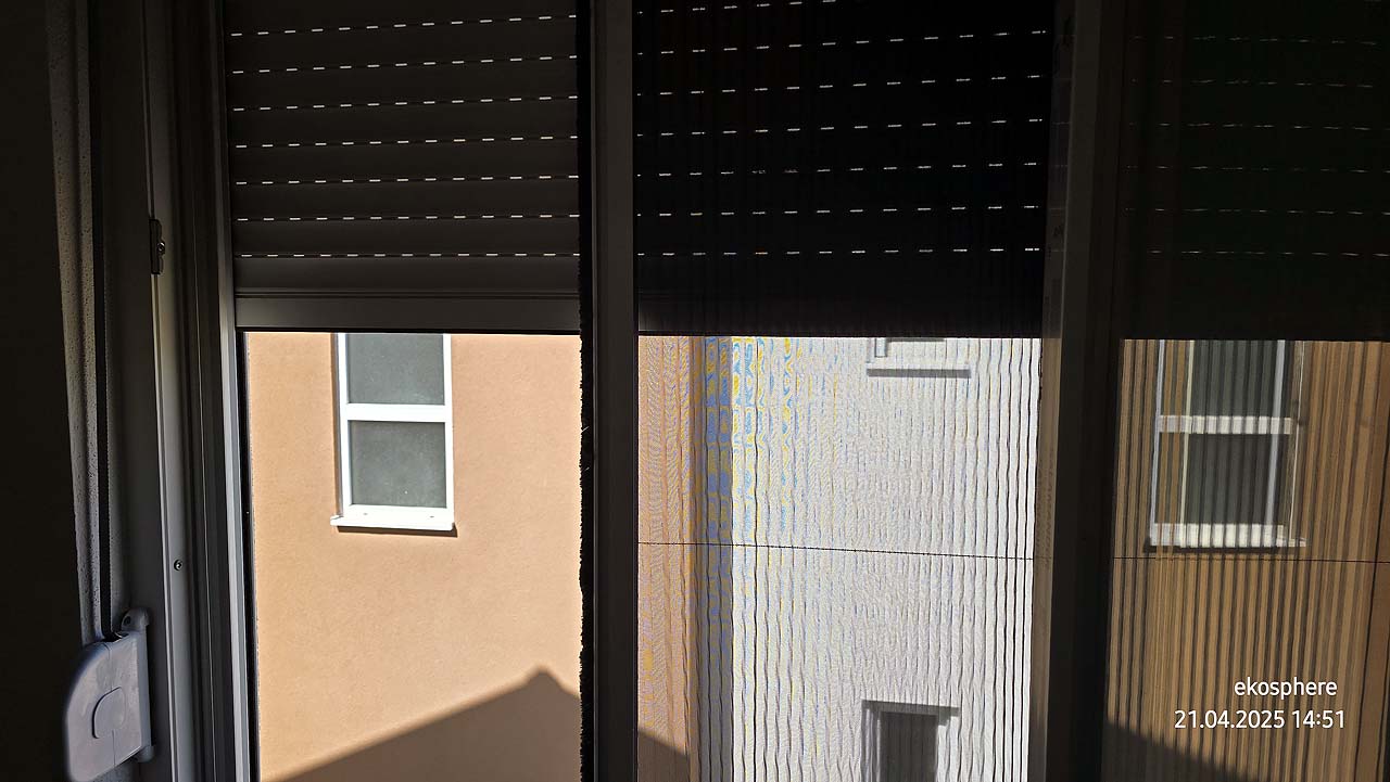 Natural light filters through partially closed shutters, showcasing two premium Ulcinj properties&mdash;ideal for investment on immobilien.ekosphere.me, a project by ekosphere doo.