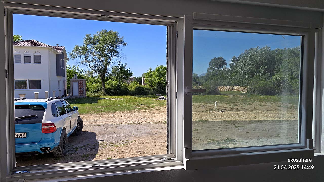 Spacious Ulcinj property: bright windows, white house, green trees, and SUV&mdash;prime Montenegro investment by EkoSphere Doo.