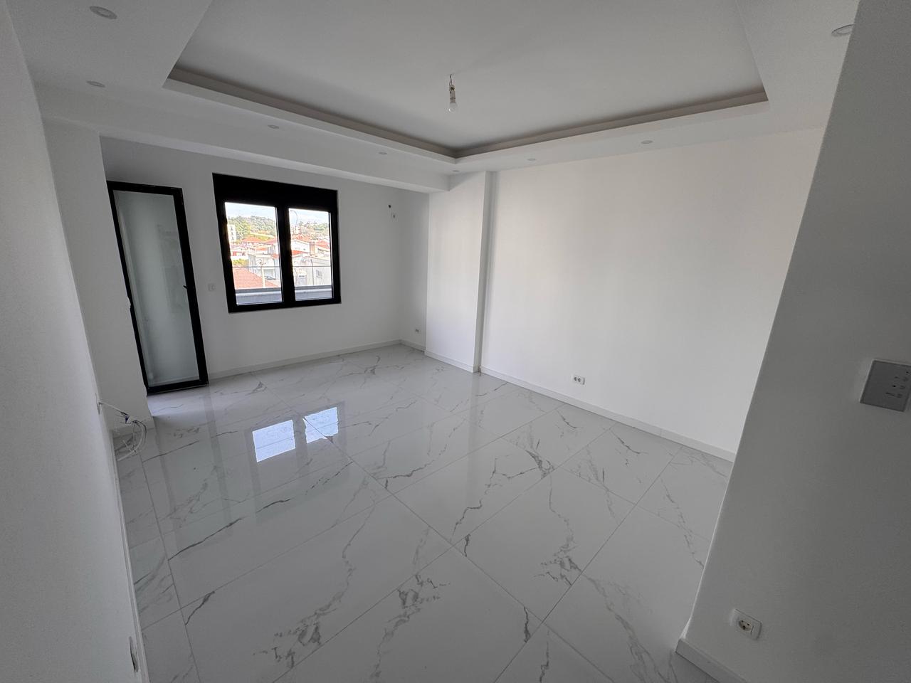Bright, modern room in Ulcinj with marble tiles and premium finishes&mdash;exclusive property by ekosphere doo at immobilien.ekosphere.me.