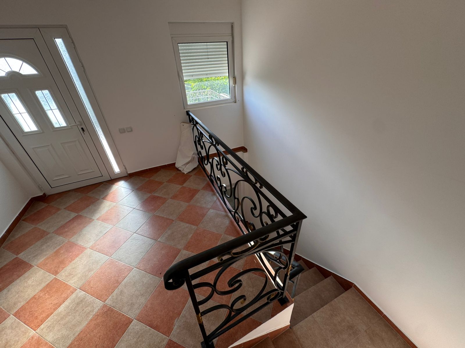 Stylish tiled hallway in Ulcinj Montenegro real estate, elegant staircase, modern entry&mdash;exclusive listing by immobilien.ekosphere.me, a project of ekosphere doo.