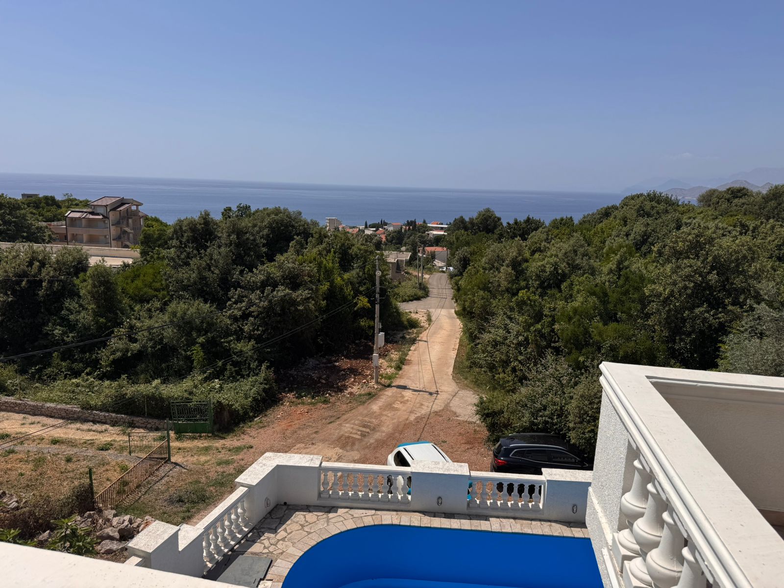 Stunning Ulcinj property with pool, sea view, hills, and parking&mdash;your investment via immobilien.ekosphere.me by ekosphere doo.