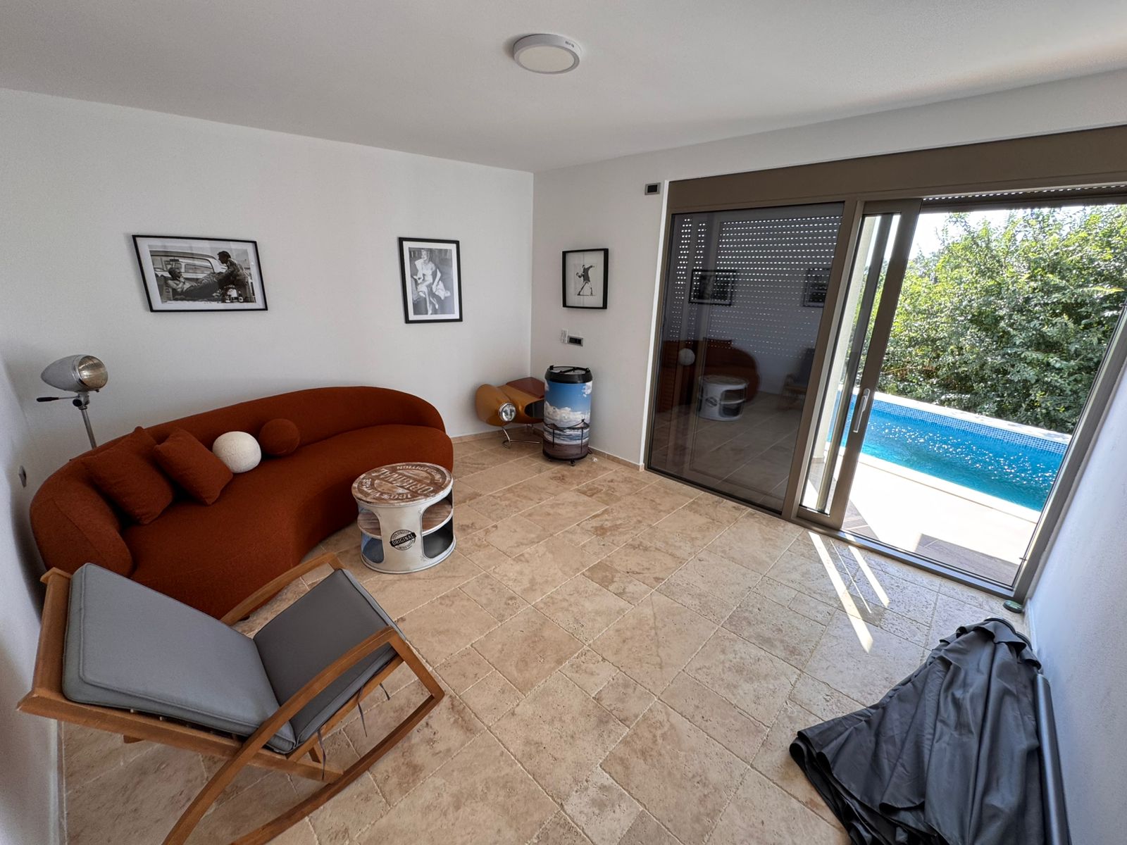 Modern room in Ulcinj with sleek furnishings, poolside access, and ekosphere style&mdash;exclusive on immobilien.ekosphere.me investment.