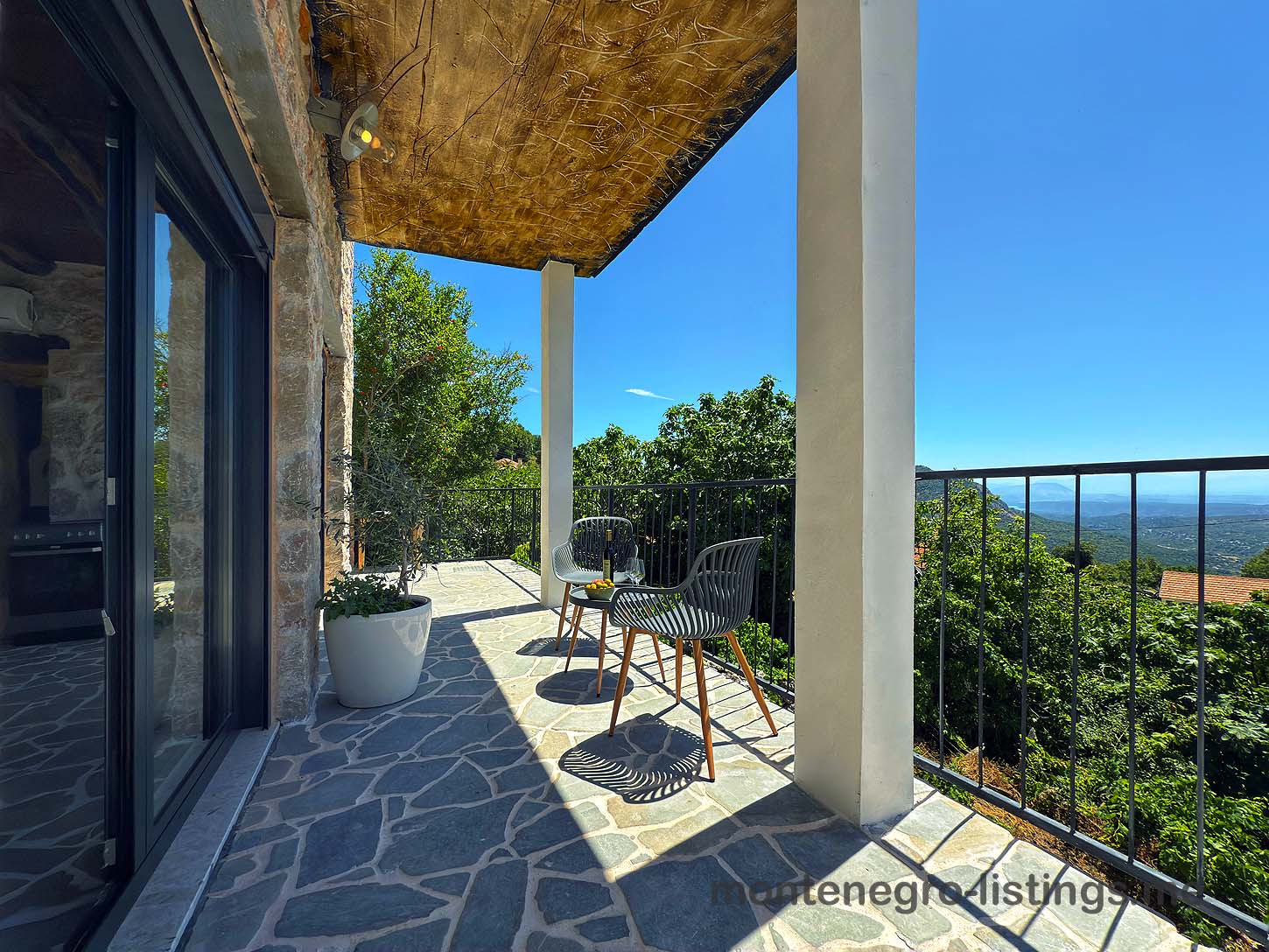 Elegant stone terrace with mountain views in Ulcinj, perfect for investors&mdash;see more at immobilien.ekosphere.me by ekosphere doo.