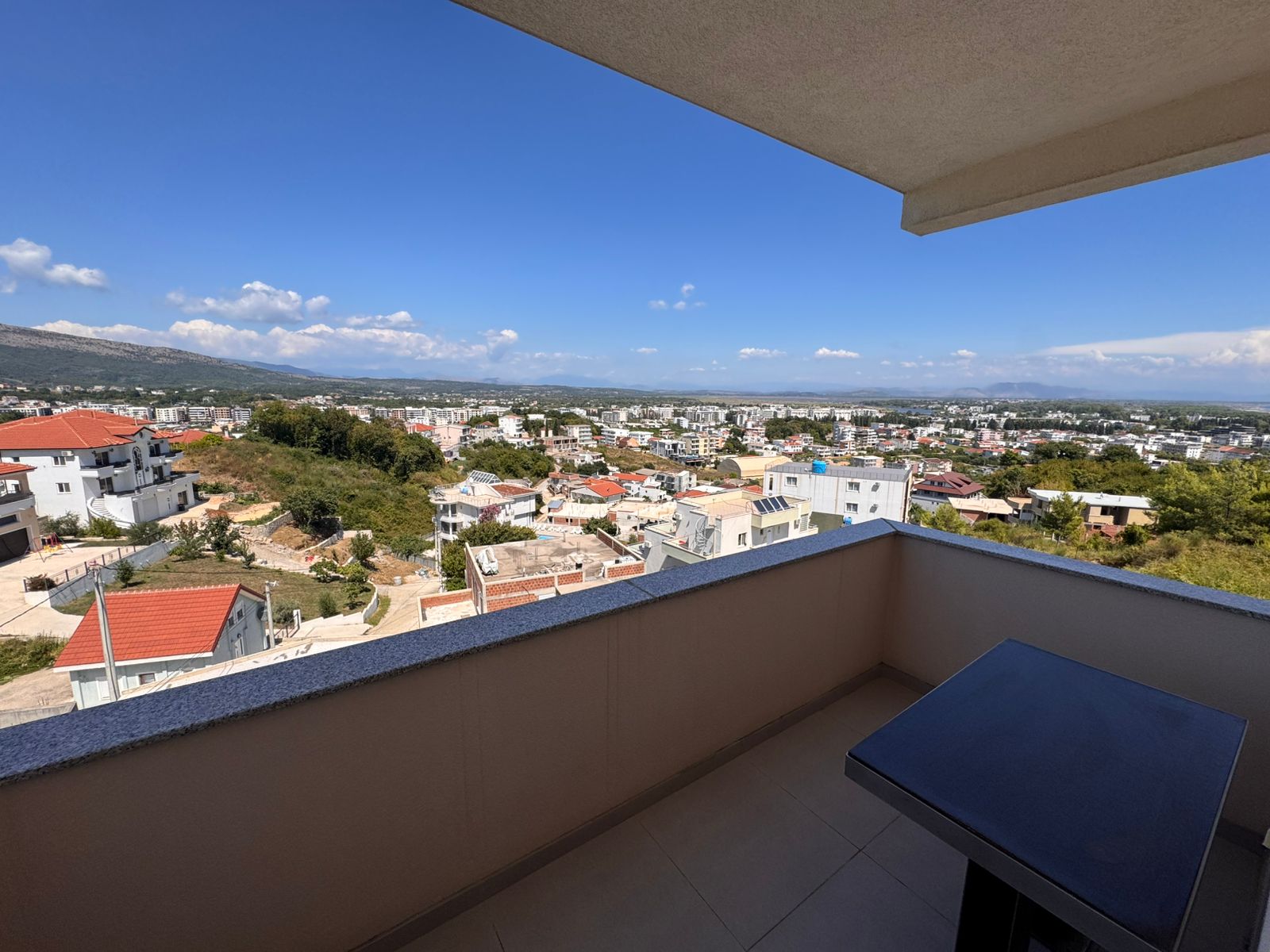 Stunning tiled balcony with panoramic views over Ulcinj real estate, perfect for investors&mdash;immobilien.ekosphere.me by Ekosphere doo.
