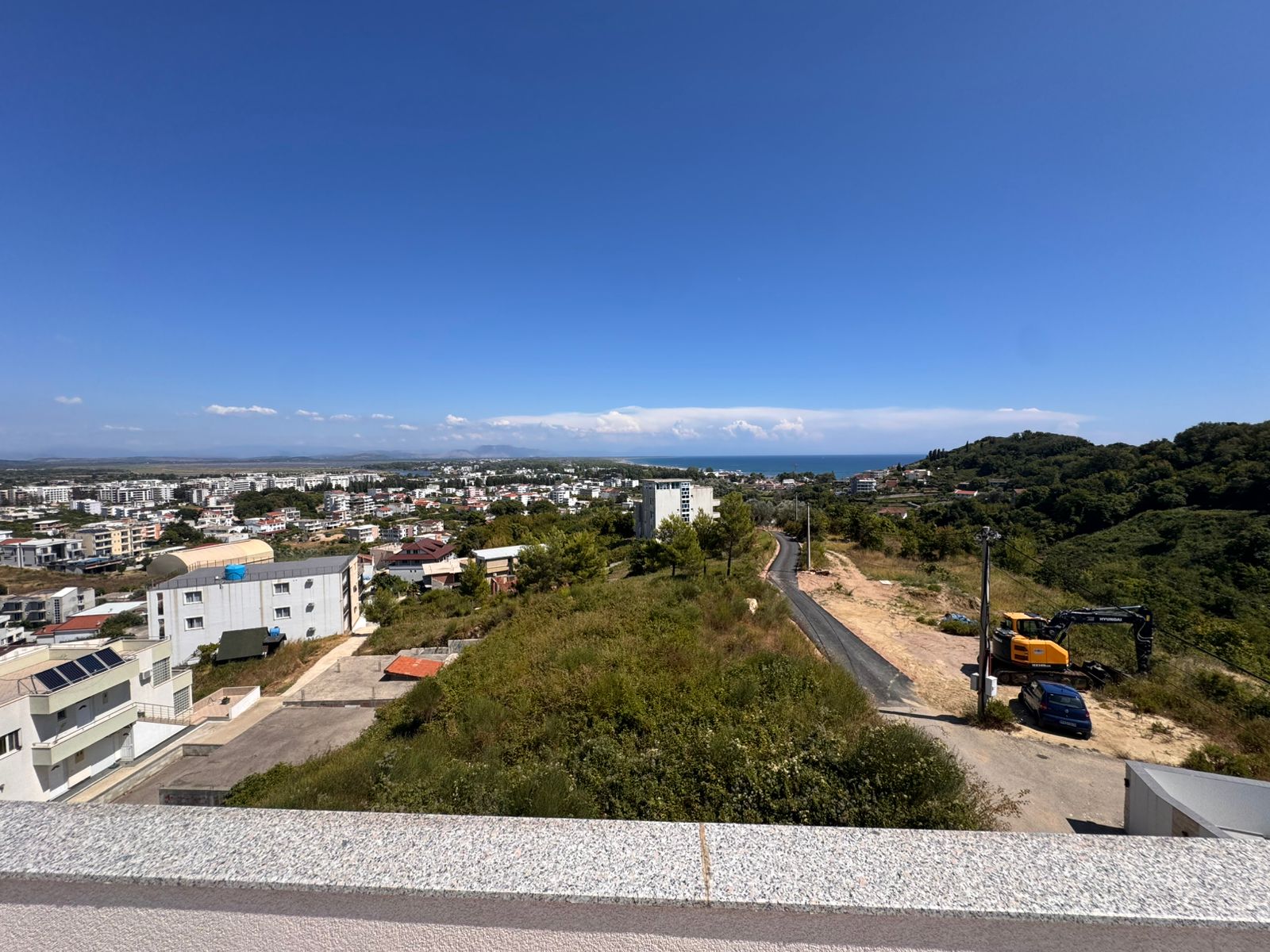Panoramic rooftop view of Ulcinj, Montenegro: modern real estate, sea views, prime investment by ekosphere doo at immobilien.ekosphere.me.