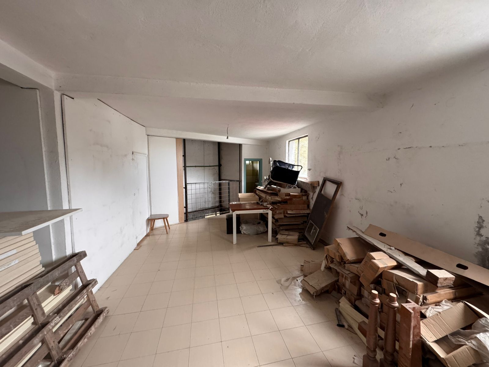 Spacious unfinished room with tiled floors, white walls, ample light&mdash;ideal investment in Ulcinj from ekosphere doo at immobilien.ekosphere.me.
