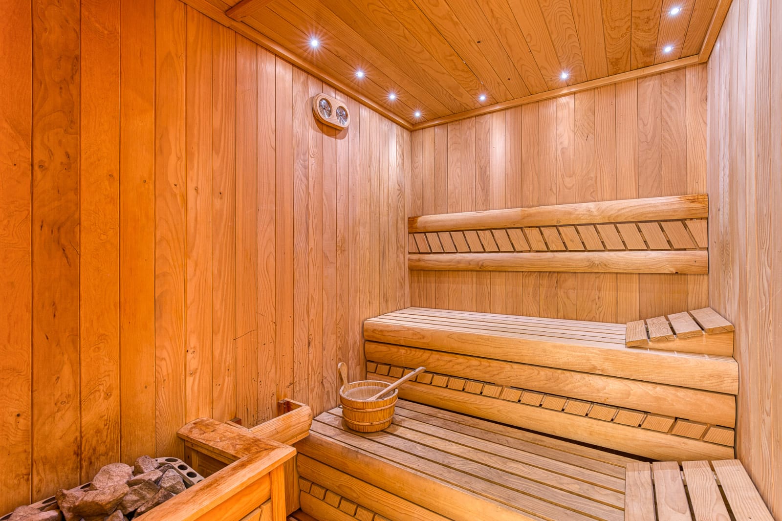 Luxurious wooden sauna with tiered benches, quality heater and ambient lighting&mdash;prime Ulcinj property. Montenegro-listings.me by Ekosphere DOO.