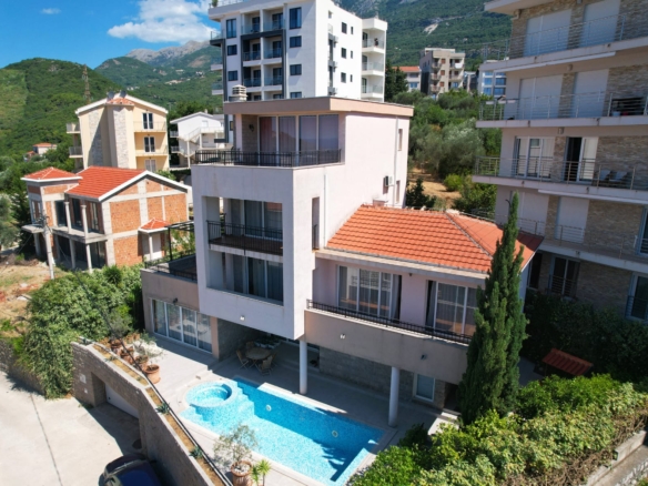 Discover a stylish multi-story home with pool, balconies, and mountain views in Ulcinj—a prime Montenegro investment via ekosphere doo.