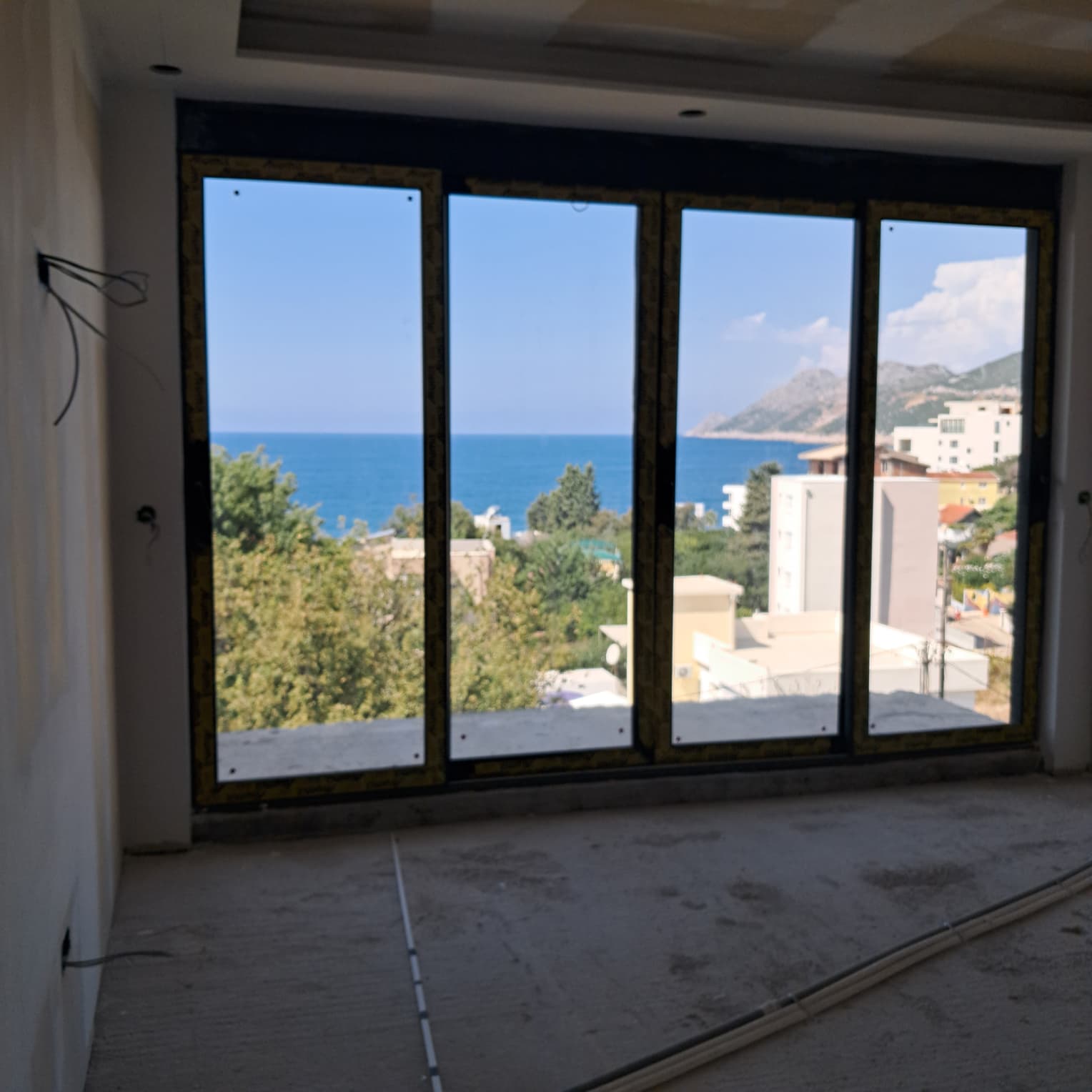 Stunning Ulcinj Montenegro investment: unfinished property with panoramic sea, city, and hill views. Exclusive at immobilien.ekosphere.me by ekosphere doo.
